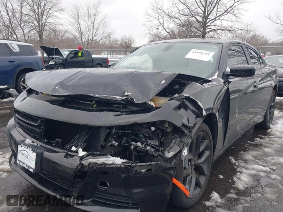 2022 Dodge Charger SXT with VIN 2C3CDXBG0NH157720, listed as a IAAI auction lot 41559731 with 21,062 mi miles and . Bid and sale history available at carsss.com. Image 6.