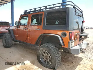 2011 Jeep Wrangler Unlimited Rubicon with VIN 1J4BA6H13BL538385, listed as a Copart auction lot 64080075 with 90,459 mi miles and Salvage title. Bid and sale history available at DreamBid. Image 2.