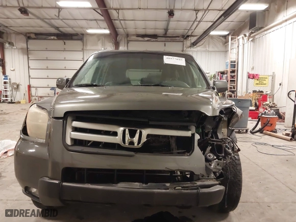 2007 Honda Pilot EX-L with VIN 2HKYF187X7H528523, listed as a IAAI auction lot 40977045 with 139,463 mi miles. Bid and sale history available at carsss.com. Image 6.
