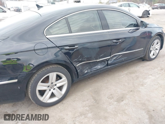 2013 Volkswagen CC Sport with VIN WVWAP7AN9DE526705, listed as a IAAI auction lot 41666264 with 145,841 mi miles. Bid and sale history available at carsss.com. Image 6.