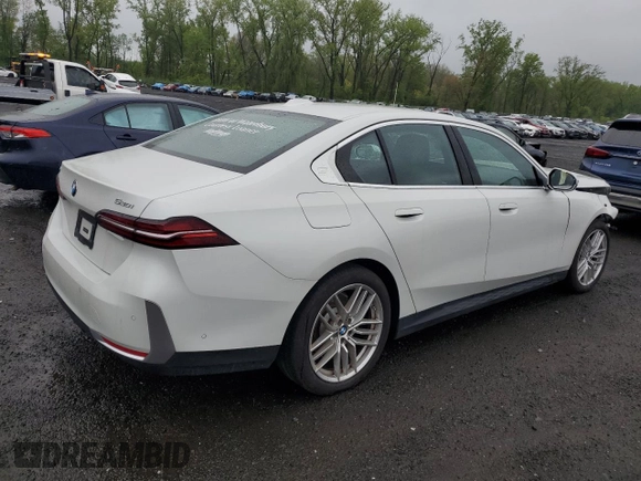 2024 BMW 5 Series 530i xDrive with VIN WBA53FJ01RCP97253, listed as a Copart auction lot 50888795 with 11,985 mi miles and Salvage title. Bid and sale history available at DreamBid. Image 3.