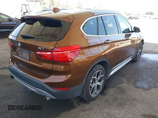 2017 BMW X1 xDrive28i with VIN WBXHT3C34H5F75885, listed as a IAAI auction lot 42655580 with 54,609 mi miles and . Bid and sale history available at DreamBid. Image 4.