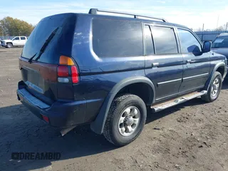 2002 Mitsubishi Montero Sport ES with VIN JA4LS21H72J054989, listed as a IAAI auction lot 41067504 with 335,479 mi miles. Bid and sale history available at carsss.com. Image 4.