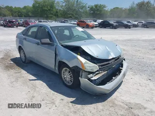 2009 Ford Focus SE with VIN 1FAHP35N19W232918, listed as a IAAI auction lot 42076066 with 165,953 mi miles. Bid and sale history available at carsss.com. Image 1.