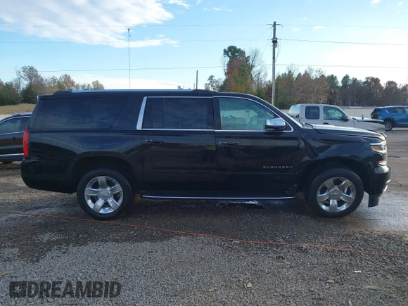 2020 Chevrolet Suburban Premier with VIN 1GNSCJKC0LR121728, listed as a IAAI auction lot 41105003 with 43,820 mi miles and . Bid and sale history available at DreamBid. Image 13.