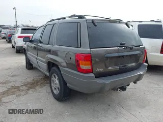 1999 Jeep Grand Cherokee Laredo с VIN 1J4G258S8XC650533, выставлен на аукционе IAAI как лот 41583331 с пробегом 245 164 миль миль и . История ставок и продаж доступна на DreamBid. Изображение 3.