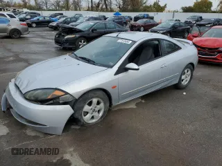 1999 Mercury Cougar z VIN 1ZWHT61L0X5643122, wystawiony jako Copart lot #77813494 z przebiegiem 97 270 mil mil oraz Szkody całkowita. Historia ofert i sprzedaży dostępna na DreamBid. Obrazek 1.