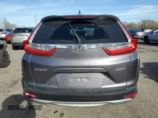 2018 Honda CR-V EX with VIN 2HKRW2H50JH691990, listed as a Copart auction lot 50433225 with 134,793 mi miles and Salvage Title. Bid and sale history available at DreamBid. Image 6.