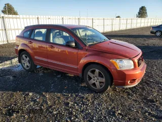 2009 Dodge Caliber SXT with VIN 1B3HB48C99D144317, listed as a Copart auction lot 79491144 with Not Provided miles and Salvage Title. Bid and sale history available at DreamBid. Image 4.