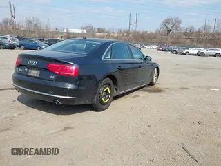2012 Audi A8 L with VIN WAURVAFD7CN004673, listed as a IAAI auction lot 41768222 with 108,982 mi miles. Bid and sale history available at carsss.com. Image 4.