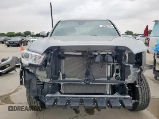 2023 Toyota Tacoma SR5 с VIN 3TMAZ5CNXPM213141, выставлен на аукционе Copart как лот 56695745 с пробегом 6 021 миль миль и Списание • Salvage title. История ставок и продаж доступна на DreamBid. Изображение 5.