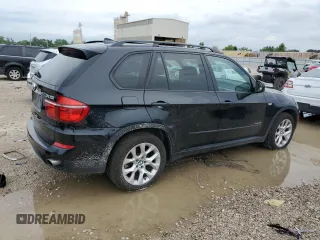 2012 BMW X5 35i with VIN 5UXZV4C50CL989832, listed as a Copart auction lot 62606485 with 157,025 mi miles and Clean title. Bid and sale history available at DreamBid. Image 3.