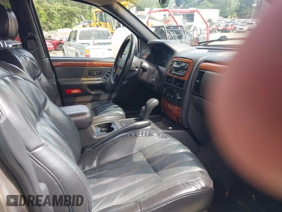 1999 Jeep Grand Cherokee Limited with VIN 1J4GW68N9XC808639, listed as a IAAI auction lot 42521785 with 156,864 mi miles and . Bid and sale history available at DreamBid. Image 5.