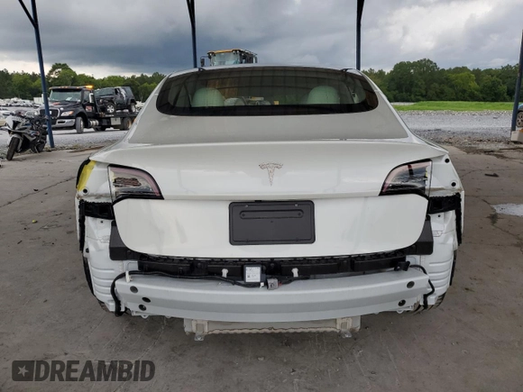 2023 Tesla Model 3 z VIN 5YJ3E1EA8PF471458, wystawiony jako Copart lot #60953035 z przebiegiem 26 773 mil mil oraz Szkoda całkowita • Salvage title. Historia ofert i sprzedaży dostępna na DreamBid. Obrazek 6.