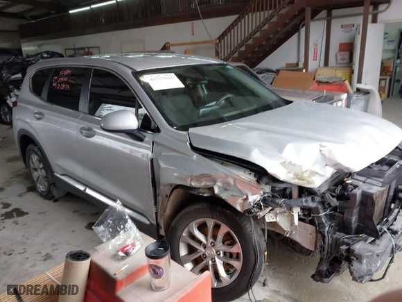 2019 Hyundai Santa Fe SE with VIN 5NMS23AD9KH035161, listed as a IAAI auction lot 41757044 with 124,835 mi miles. Bid and sale history available at carsss.com. Image 1.