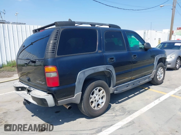 2001 Chevrolet Tahoe LT with VIN 1GNEK13T41R197657, listed as a IAAI auction lot 42164367 with 200,507 mi miles. Bid and sale history available at carsss.com. Image 4.