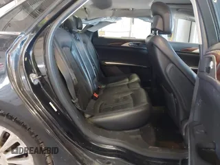 2013 Lincoln MKZ z VIN 3LN6L2G94DR823887, wystawiony jako IAAI lot #42054666 z przebiegiem 101 866 mil mil oraz . Historia ofert i sprzedaży dostępna na DreamBid. Obrazek 8.