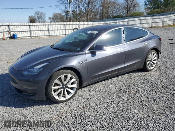 2019 Tesla Model 3 Mid Range with VIN 5YJ3E1EA5KF412702, listed as a Copart auction lot 50008895 with 134,178 mi miles and Salvage Title. Bid and sale history available at carsss.com. Image 1.