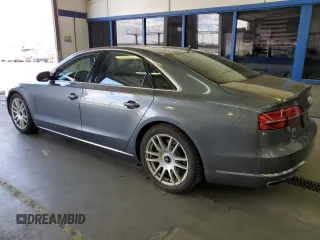 2015 Audi A8 with VIN WAUJGAFD3FN016587, listed as a Copart auction lot 60778904 with 116,818 mi miles and Clean title. Bid and sale history available at DreamBid. Image 2.
