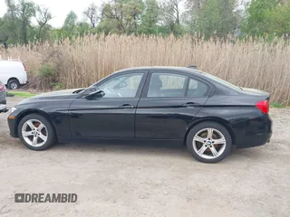 2014 BMW 3 Series 320i xDrive with VIN WBA3C3G5XENS68374, listed as a IAAI auction lot 42042243 with 107,830 mi miles. Bid and sale history available at carsss.com. Image 14.