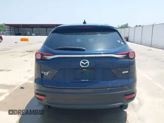2018 Mazda CX-9 Touring with VIN JM3TCBCY3J0220372, listed as a IAAI auction lot 42405192 with 104,556 mi miles and . Bid and sale history available at DreamBid. Image 16.