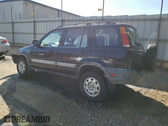 1999 Honda CR-V LX with VIN JHLRD2847XC021888, listed as a Copart auction lot 76556164 with 285,517 mi miles and Salvage Title. Bid and sale history available at carsss.com. Image 2.