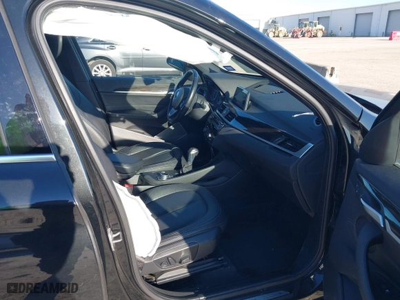 2018 BMW X1 sDrive28i with VIN WBXHU7C37J5H43318, listed as a IAAI auction lot 41294730 with 73,600 mi miles. Bid and sale history available at carsss.com. Image 5.