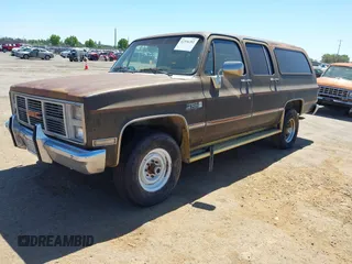 1986 GMC Suburban z VIN 1G5GK26M5GF524029, wystawiony jako IAAI lot #42336202 z przebiegiem 88 623 mil mil oraz . Historia ofert i sprzedaży dostępna na DreamBid. Obrazek 2.