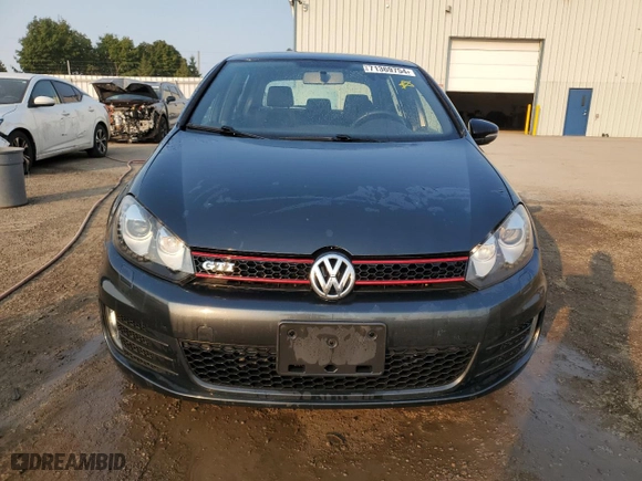 2013 Volkswagen GTI with VIN WVWGV7AJ3DW140062, listed as a Copart auction lot 71369754 with 141695 miles and Clean Title. Bid and sale history available at carsss.com. Image 5.