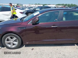 2014 Kia Optima LX with VIN 5XXGM4A70EG273483, listed as a IAAI auction lot 42402765 with 129,770 mi miles and . Bid and sale history available at DreamBid. Image 14.