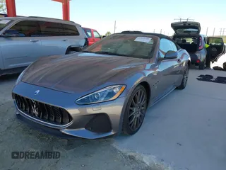 2019 Maserati GranTurismo Convertible Sport with VIN ZAM45VMA3K0318440, listed as a IAAI auction lot 41843305 with 14,296 mi miles. Bid and sale history available at carsss.com. Image 2.