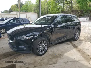 2020 Mazda CX-5 Grand Touring with VIN JM3KFADM1L0786963, listed as a Copart auction lot 52650035 with 68,606 mi miles and Salvage Title. Bid and sale history available at carsss.com. Image 1.