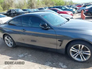 2015 BMW 4 Series 428i xDrive z VIN WBA3N5C55FK484938, wystawiony jako IAAI lot #41889907 z przebiegiem 100 439 mil mil oraz . Historia ofert i sprzedaży dostępna na DreamBid. Obrazek 13.