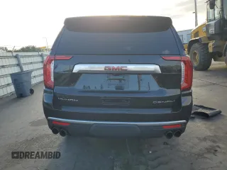 2021 GMC Yukon XL Denali z VIN 1GKS2JKL7MR242953, wystawiony jako Copart lot #52175335 z przebiegiem 141 890 mil mil oraz Szkody całkowita. Historia ofert i sprzedaży dostępna na DreamBid. Obrazek 6.