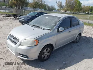 2007 Chevrolet Aveo LS with VIN KL1TD56687B084620, listed as a IAAI auction lot 41719793 with 119,233 mi miles and . Bid and sale history available at DreamBid. Image 2.