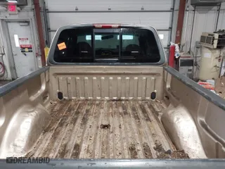 1999 Ford F-150 Work Series with VIN 1FTRX18W0XKA68363, listed as a IAAI auction lot 41524104 with 218,400 mi miles. Bid and sale history available at carsss.com. Image 12.