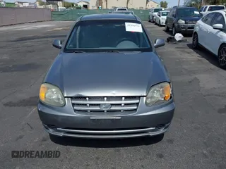 2003 Hyundai Accent GL with VIN KMHCG45C73U471607, listed as a IAAI auction lot 41956551 with 222,305 mi miles. Bid and sale history available at carsss.com. Image 6.