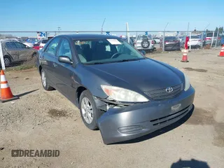 2004 Toyota Camry LE with VIN 4T1BF30K74U588368, listed as a IAAI auction lot 41659383 with 190,833 mi miles. Bid and sale history available at carsss.com. Image 1.