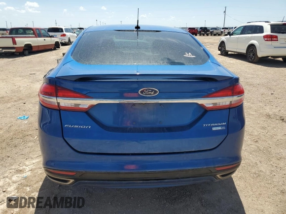 2018 Ford Fusion Titanium z VIN 3FA6P0D93JR187966, wystawiony jako Copart lot #54171825 z przebiegiem 86 575 mil mil oraz Szkoda całkowita • Salvage title. Historia ofert i sprzedaży dostępna na DreamBid. Obrazek 6.