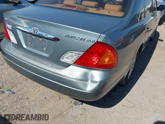 2001 Toyota Avalon XL z VIN 4T1BF28B21U145748, wystawiony jako IAAI lot #42251004 z przebiegiem 182 959 mil mil oraz . Historia ofert i sprzedaży dostępna na DreamBid. Obrazek 6.