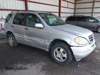 2003 Mercedes-Benz M 320 with VIN 4JGAB54E23A376114, listed as a IAAI auction lot 42578534 with 144,494 mi miles and . Bid and sale history available at DreamBid. Image 1.