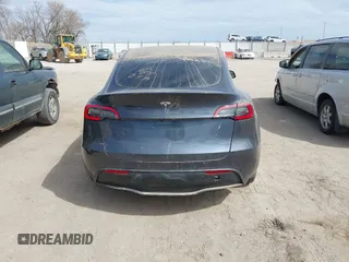 2022 Tesla Model Y Long Range with VIN 7SAYGDEE5NF534259, listed as a IAAI auction lot 41860246 with 24,513 mi miles and . Bid and sale history available at carsss.com. Image 16.