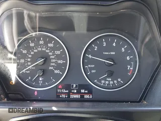 2015 BMW 2 Series 228i with VIN WBA1F5C58FV257570, listed as a IAAI auction lot 41783929 with 229,893 mi miles. Bid and sale history available at carsss.com. Image 7.