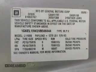 1997 GMC Safari with VIN 1GKEL19W2VB506844, listed as a IAAI auction lot 41719861 with 228,306 mi miles and . Bid and sale history available at carsss.com. Image 9.