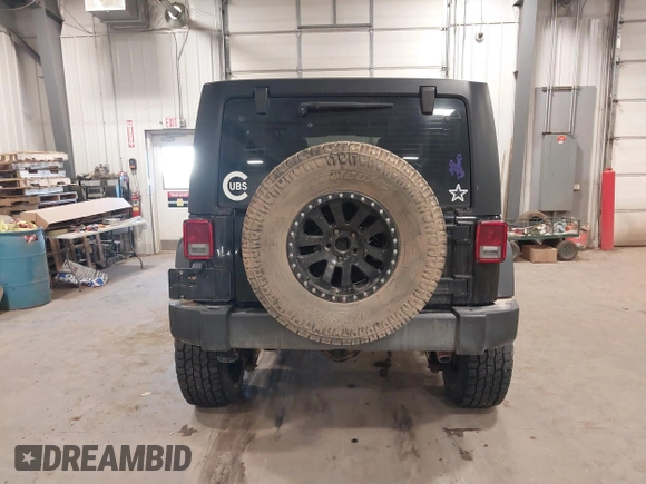 2017 Jeep Wrangler Unlimited Sport with VIN 1C4BJWDGXHL698014, listed as a IAAI auction lot 41384325 with 121,402 mi miles. Bid and sale history available at carsss.com. Image 17.