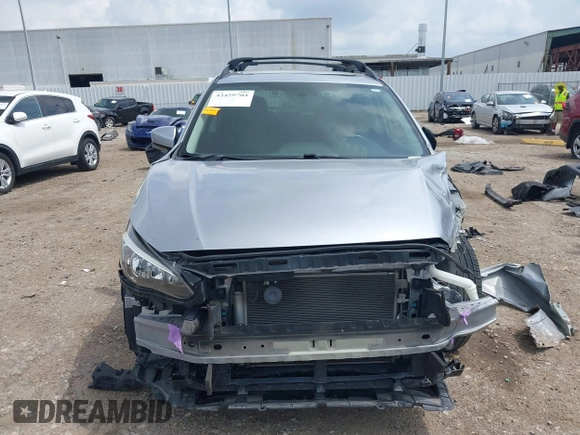 2020 Subaru Crosstrek Premium with VIN JF2GTAEC4L8204435, listed as a IAAI auction lot 42459704 with 105,671 mi miles and . Bid and sale history available at DreamBid. Image 13.