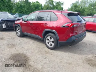 2019 Toyota RAV4 XLE with VIN JTMP1RFV2KD021348, listed as a IAAI auction lot 42198925 with 130,838 mi miles and . Bid and sale history available at DreamBid. Image 3.