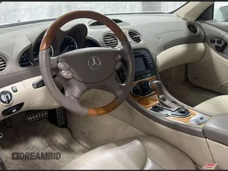 2007 Mercedes-Benz SL 550 z VIN WDBSK71FX7F129349, wystawiony jako Copart lot #60161885 z przebiegiem 108 178 mil mil oraz Czysty tytuł • Clean title. Historia ofert i sprzedaży dostępna na DreamBid. Obrazek 9.