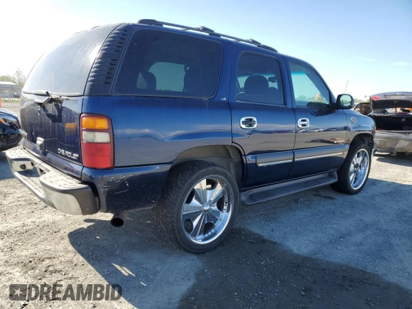 2002 Chevrolet Tahoe LS z VIN 1GNEC13T42R256432, wystawiony jako Copart lot #51706375 z przebiegiem 193 298 mil mil oraz Szkoda całkowita • Salvage title. Historia ofert i sprzedaży dostępna na DreamBid. Obrazek 3.
