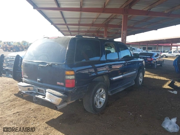 2005 GMC Yukon SLT with VIN 1GKEC13T35J185918, listed as a IAAI auction lot 41025720 with 162,613 mi miles. Bid and sale history available at carsss.com. Image 4.